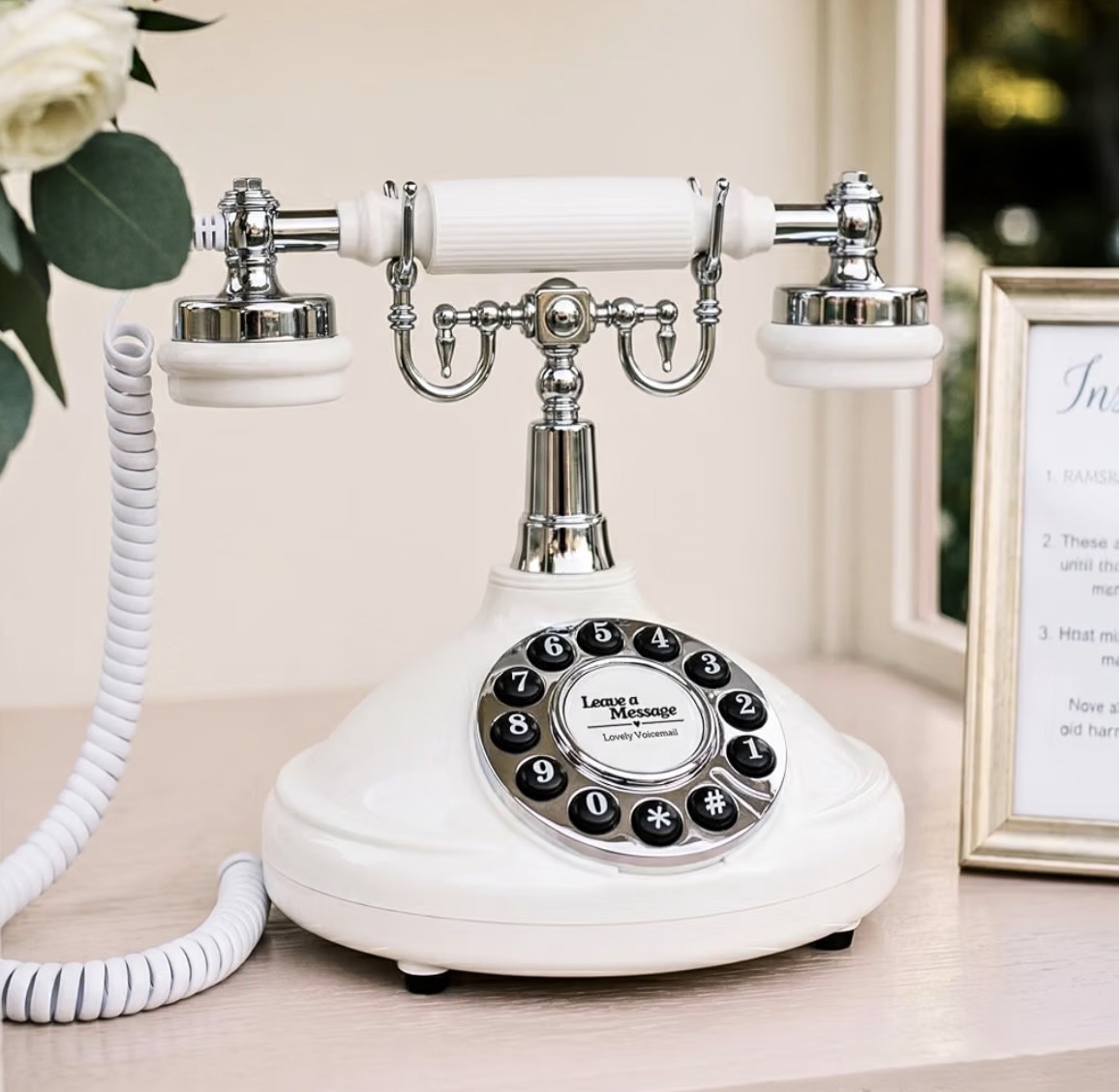 Elegant white and chrome vintage telephone for a wedding audio guestbook